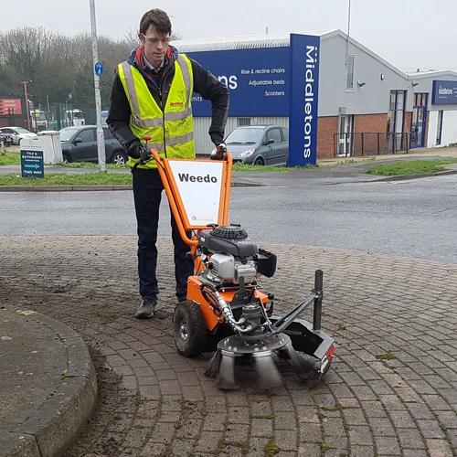 Weed management for hard surfaces